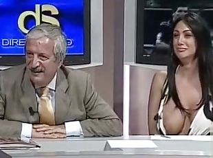 Italian woman flashes her giant tits on TV show
