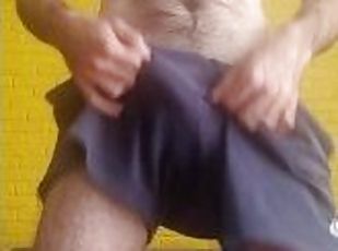 Horny hairy guy jerks his thick dick fast, moaning and cumming hard